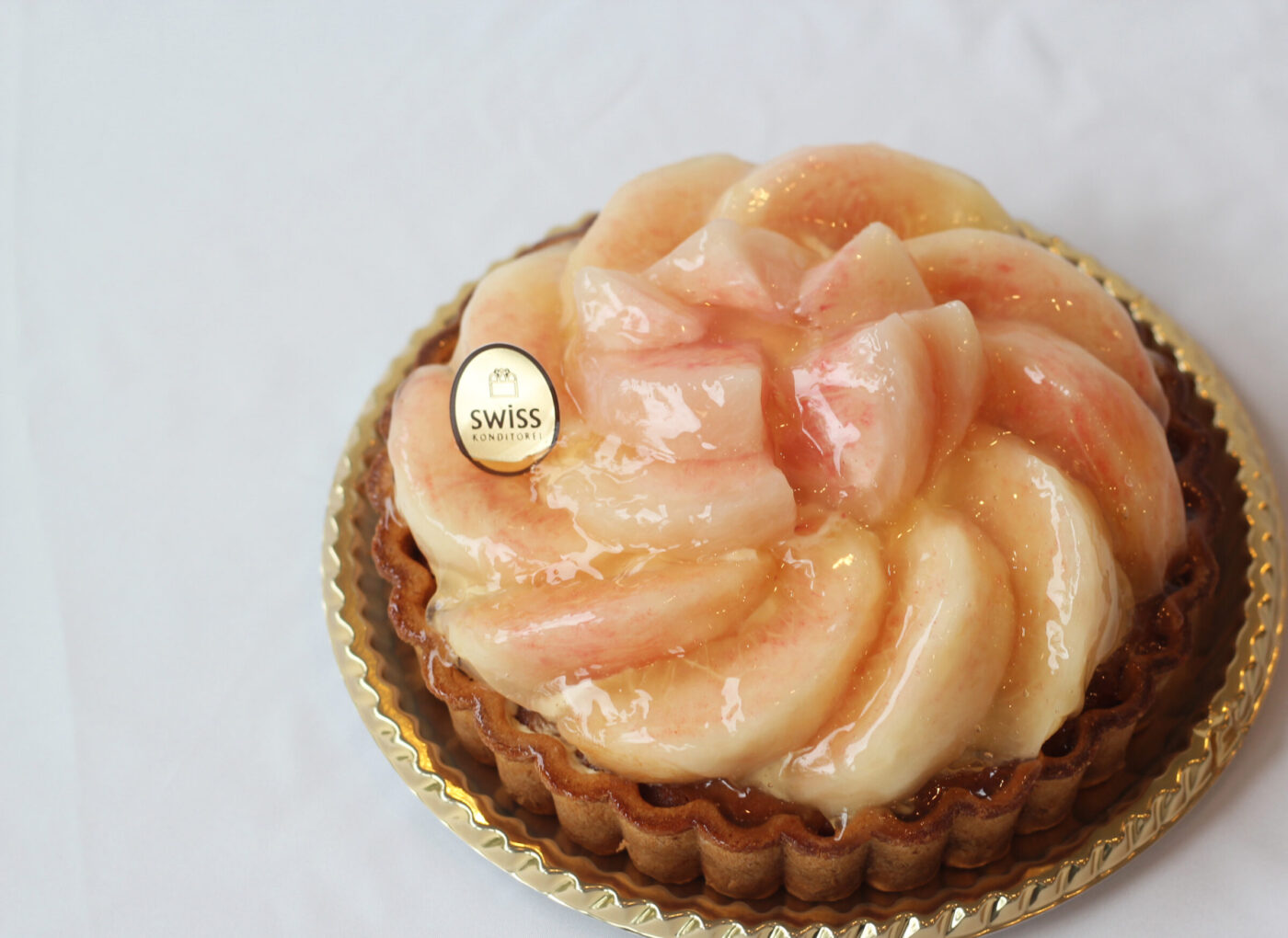 旬の桃を使ったケーキ | お知らせ | SWISS洋菓子店